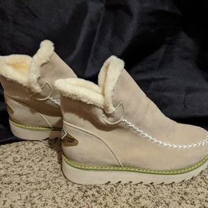 1 pair Tan fur insulated booties. 1 Black pair